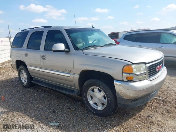 2005 GMC Yukon SLT with VIN 1GKEC13T05R127797, listed as a IAAI auction lot 41540673 with 241,617 mi miles. Bid and sale history available at carsss.com. Image 1.