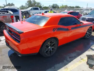 2016 Dodge Challenger R/T with VIN 2C3CDZBT7GH332055, listed as a IAAI auction lot 41744393 with 152,900 mi miles. Bid and sale history available at carsss.com. Image 4.
