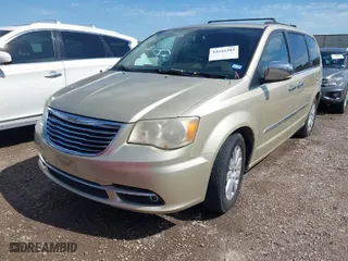 2011 Chrysler Town & Country Touring-L with VIN 2A4RR8DG1BR676754, listed as a IAAI auction lot 41644384 with 191,875 mi miles. Bid and sale history available at carsss.com. Image 2.