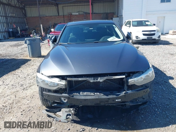 2014 BMW 3 Series 320i xDrive with VIN WBA3C3C54EP661409, listed as a IAAI auction lot 42182593 with 159,104 mi miles and . Bid and sale history available at DreamBid. Image 13.