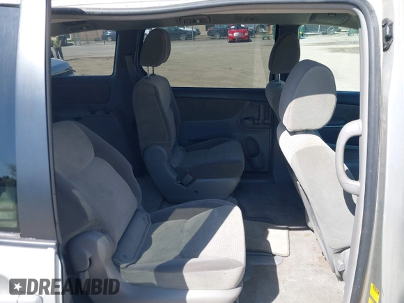 2009 Toyota Sienna CE with VIN 5TDZK23C19S263613, listed as a IAAI auction lot 41983708 with 162,395 mi miles. Bid and sale history available at carsss.com. Image 8.
