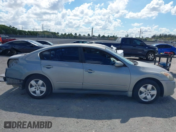 2007 Nissan Altima 2.5 S with VIN 1N4AL21E27C174572, listed as a IAAI auction lot 41561396 with 148,497 mi miles. Bid and sale history available at carsss.com. Image 14.
