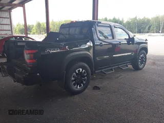 2023 Nissan Frontier SV with VIN 1N6ED1EK1PN634535, listed as a IAAI auction lot 42748147 with 32,304 mi miles and . Bid and sale history available at DreamBid. Image 4.