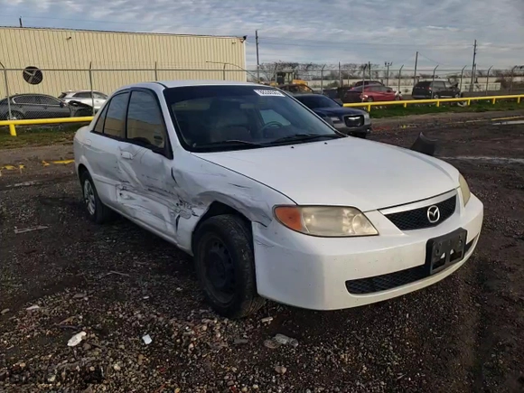 2001 Mazda Protege DX with VIN JM1BJ222410441812, listed as a Copart auction lot 88330565 with 169,447 mi miles and Salvage Title. Bid and sale history available at carsss.com. Image 11.