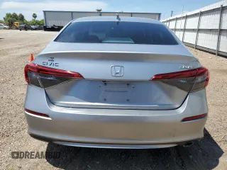 2022 Honda Civic Sport z VIN 2HGFE2F5XNH597365, wystawiony jako Copart lot #55620735 z przebiegiem 28 526 mil mil oraz Szkoda całkowita • Salvage title. Historia ofert i sprzedaży dostępna na DreamBid. Obrazek 6.