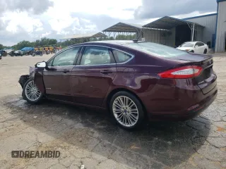2013 Ford Fusion SE Hybrid z VIN 3FA6P0LU7DR197801, wystawiony jako Copart lot #60468095 z przebiegiem 169 215 mil mil oraz Szkoda całkowita • Salvage title. Historia ofert i sprzedaży dostępna na DreamBid. Obrazek 2.