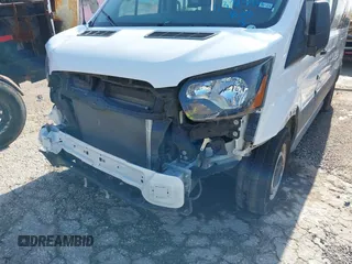 2024 Ford Transit Passenger XL with VIN 1FBAX2C89PKB52360, listed as a IAAI auction lot 41381594 with 43,067 mi miles and . Bid and sale history available at DreamBid. Image 17.