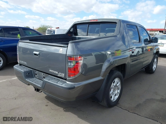2013 Honda Ridgeline RTS with VIN 5FPYK1F4XDB016430, listed as a IAAI auction lot 41711524 with 132,185 mi miles. Bid and sale history available at carsss.com. Image 4.