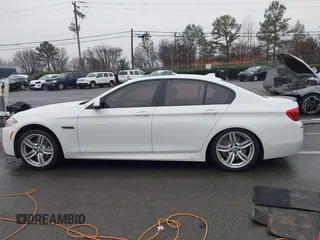 2014 BMW 5 Series 535d with VIN WBAXA5C58ED690612, listed as a IAAI auction lot 41570616 with 95,124 mi miles and . Bid and sale history available at carsss.com. Image 15.