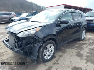 2018 Kia Sportage LX with VIN KNDPMCAC3J7380179, listed as a IAAI auction lot 41672067 with 134,390 mi miles. Bid and sale history available at carsss.com. Image 18.