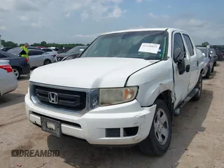 2010 Honda Ridgeline RT z VIN 5FPYK1F20AB004961, wystawiony jako IAAI lot #42120833 z przebiegiem 311 486 mil mil oraz . Historia ofert i sprzedaży dostępna na DreamBid. Obrazek 2.