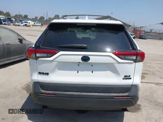 2022 Toyota RAV4 Hybrid XLE with VIN 2T3RWRFV9NW130472, listed as a IAAI auction lot 40990707 with 156,174 mi miles and . Bid and sale history available at DreamBid. Image 16.