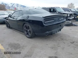 2015 Dodge Challenger R/T with VIN 2C3CDZATXFH712765, listed as a IAAI auction lot 41817210 with 99,535 mi miles and . Bid and sale history available at DreamBid. Image 3.