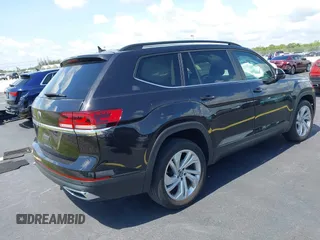 2021 Volkswagen Atlas SE with VIN 1V2WR2CA1MC607768, listed as a IAAI auction lot 42518885 with 49,286 mi miles and . Bid and sale history available at DreamBid. Image 4.