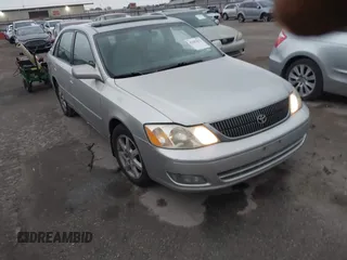 2001 Toyota Avalon XL z VIN 4T1BF28BX1U132679, wystawiony jako IAAI lot #42091673 z przebiegiem 160 394 mil mil oraz . Historia ofert i sprzedaży dostępna na DreamBid. Obrazek 1.