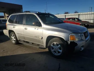 2005 GMC Envoy SLT with VIN 1GKDT13SX52276648, listed as a Copart auction lot 42944265 with 211,633 mi miles and Clean Title. Bid and sale history available at carsss.com. Image 4.