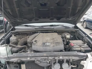 2014 Toyota Tacoma PreRunner with VIN 3TMKU4HN9EM041509, listed as a IAAI auction lot 42441194 with 290,715 mi miles and . Bid and sale history available at DreamBid. Image 10.