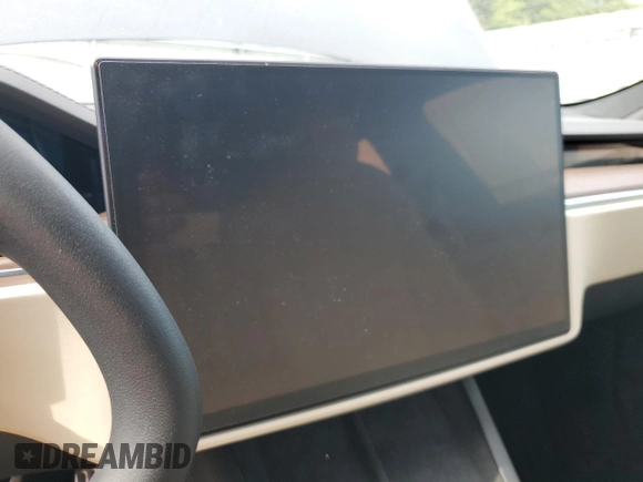 2022 Tesla Model S with VIN 5YJSA1E5XNF471212, listed as a Copart auction lot 57384025 with Not provided miles and Salvage title. Bid and sale history available at DreamBid. Image 9.