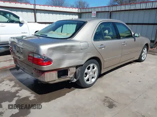 2002 Mercedes-Benz E-Class with VIN WDBJF65J42B394017, listed as a IAAI auction lot 41706917 with 188,883 mi miles. Bid and sale history available at carsss.com. Image 4.