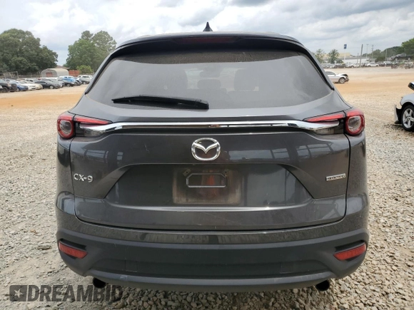 2020 Mazda CX-9 Touring z VIN JM3TCACY3L0411822, wystawiony jako Copart lot #60323295 z przebiegiem 61 348 mil mil oraz Szkoda całkowita • Salvage title. Historia ofert i sprzedaży dostępna na DreamBid. Obrazek 6.