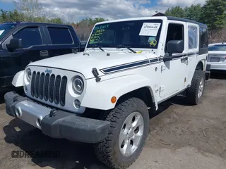 2015 Jeep Wrangler Unlimited Sahara with VIN 1C4HJWEG6FL556460, listed as a IAAI auction lot 42066648 with 54,747 mi miles. Bid and sale history available at carsss.com. Image 19.