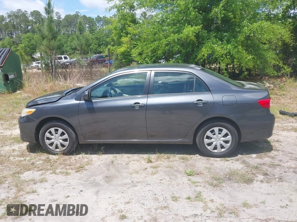 2011 Toyota Corolla L with VIN 2T1BU4EE0BC680158, listed as a IAAI auction lot 42060987 with 131,669 mi miles. Bid and sale history available at carsss.com. Image 14.