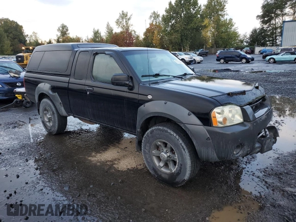 2002 Nissan Frontier XE with VIN 1N6ED26Y52C361595, listed as a Copart auction lot 77796414 with 170,555 mi miles and Salvage title. Bid and sale history available at DreamBid. Image 4.