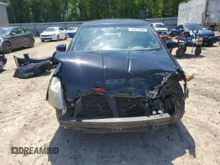 2011 Nissan Sentra SR with VIN 3N1AB6APXBL685663, listed as a Copart auction lot 52077355 with 217,006 mi miles and Salvage Title. Bid and sale history available at DreamBid. Image 5.