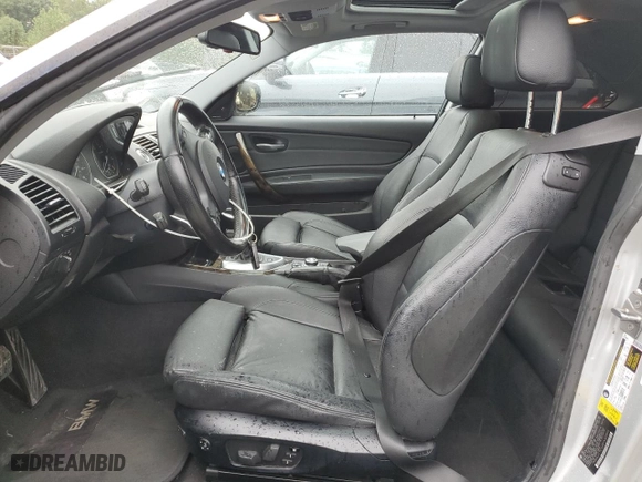 2011 BMW 1 Series 135i with VIN WBAUC9C56BVM09045, listed as a Copart auction lot 73316874 with 125,679 mi miles and Salvage Title. Bid and sale history available at carsss.com. Image 7.