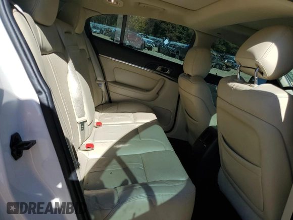 2013 Lincoln MKS z VIN 1LNHL9DK0DG605400, wystawiony jako Copart lot #77071034 z przebiegiem 73 450 mil mil oraz Szkoda całkowita • Salvage title. Historia ofert i sprzedaży dostępna na DreamBid. Obrazek 10.