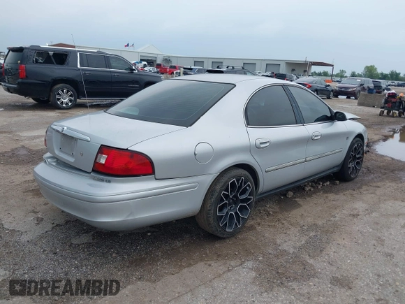 2000 Mercury Sable LS Premium with VIN 1MEFM55S7YA629796, listed as a IAAI auction lot 39526292 with 149,411 mi miles. Bid and sale history available at carsss.com. Image 4.
