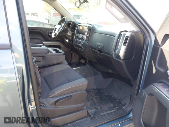2014 Chevrolet Silverado 1500 LT with VIN 3GCUKREH9EG313565, listed as a IAAI auction lot 42003086 with 112,322 mi miles and . Bid and sale history available at DreamBid. Image 5.