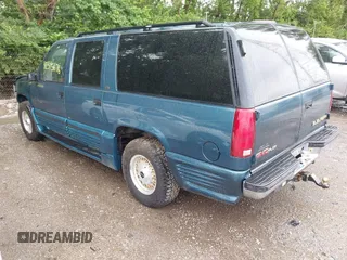 1995 GMC Suburban with VIN 1GDFK16K8SJ741041, listed as a IAAI auction lot 42315676 with 159,312 mi miles and . Bid and sale history available at DreamBid. Image 3.