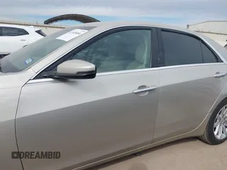 2014 Cadillac CTS Luxury RWD with VIN 1G6AR5SX6E0132580, listed as a IAAI auction lot 41349654 with 113,157 mi miles. Bid and sale history available at carsss.com. Image 14.