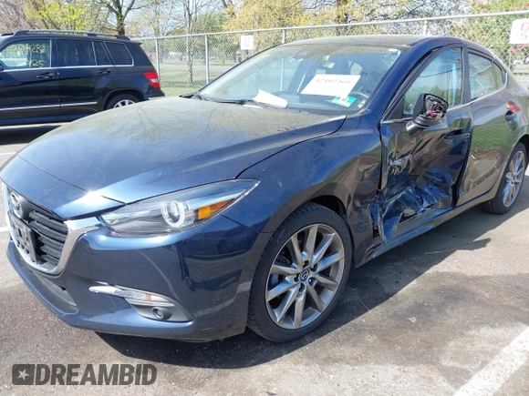 2018 Mazda 3 Grand Touring with VIN 3MZBN1W36JM213063, listed as a IAAI auction lot 42102460 with 49,180 mi miles and . Bid and sale history available at DreamBid. Image 17.