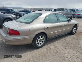 2002 Mercury Sable GS z VIN 1MEFM50U52A643924, wystawiony jako IAAI lot #41900910 z przebiegiem 150 413 mil mil oraz . Historia ofert i sprzedaży dostępna na DreamBid. Obrazek 4.