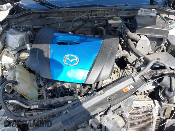 2012 Mazda Mazda3 i Touring with VIN JM1BL1L89C1558242, listed as a IAAI auction lot 42057513 with 112,094 mi miles. Bid and sale history available at carsss.com. Image 10.