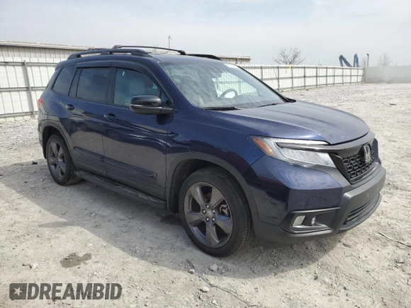 2021 Honda Passport Touring with VIN 5FNYF8H99MB042984, listed as a Copart auction lot 52858975 with 35,308 mi miles and Salvage title. Bid and sale history available at DreamBid. Image 4.
