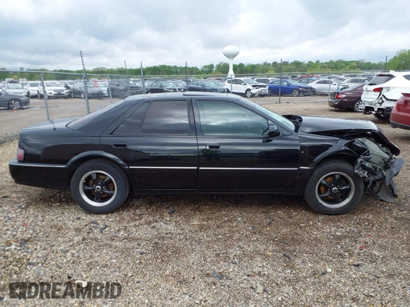 1994 Cadillac Seville STS z VIN 1G6KY5296RU823387, wystawiony jako IAAI lot #42151901 z przebiegiem 165 918 mil mil oraz . Historia ofert i sprzedaży dostępna na DreamBid. Obrazek 14.