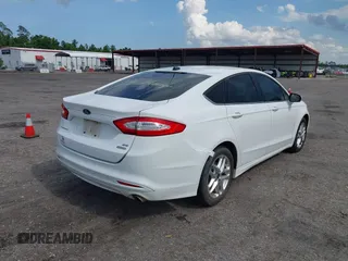 2013 Ford Fusion SE with VIN 3FA6P0HR4DR289243, listed as a IAAI auction lot 42361387 with 210,410 mi miles and . Bid and sale history available at DreamBid. Image 4.