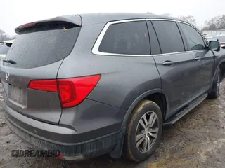 2017 Honda Pilot EX-L with VIN 5FNYF5H8XHB018480, listed as a IAAI auction lot 41049028 with 136,748 mi miles and . Bid and sale history available at DreamBid. Image 4.