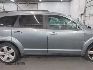 2010 Dodge Journey SXT with VIN 3D4PH5FV8AT283259, listed as a IAAI auction lot 41773863 with Not Provided miles and . Bid and sale history available at DreamBid. Image 14.