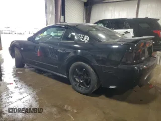 2003 Ford Mustang GT Deluxe with VIN 1FAFP42X93F434934, listed as a Copart auction lot 46980295 with 146,399 mi miles and Clean Title. Bid and sale history available at carsss.com. Image 2.