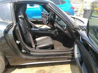 2021 Mazda MX-5 Miata Grand Touring z VIN JM1NDAM75M0451597, wystawiony jako IAAI lot #41932712 z przebiegiem 61 710 mil mil oraz . Historia ofert i sprzedaży dostępna na DreamBid. Obrazek 5.