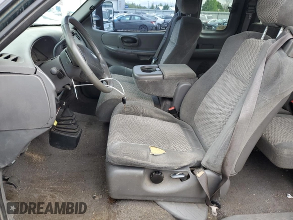 2001 Ford F-150 XL z VIN 1FTRX18L41NB56019, wystawiony jako Copart lot #62537655 z przebiegiem Nie podano mil oraz Szkoda całkowita • Salvage title. Historia ofert i sprzedaży dostępna na DreamBid. Obrazek 7.