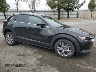 2023 Mazda CX-30 S Preferred with VIN 3MVDMBCM5PM515372, listed as a Copart auction lot 43587195 with 29,437 mi miles and Salvage Title. Bid and sale history available at DreamBid. Image 4.