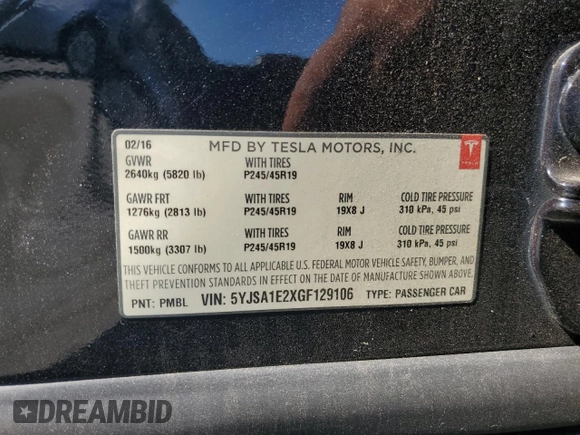2016 Tesla Model S 90D with VIN 5YJSA1E2XGF129106, listed as a Copart auction lot 59162185 with 136,004 mi miles and Salvage title. Bid and sale history available at DreamBid. Image 13.