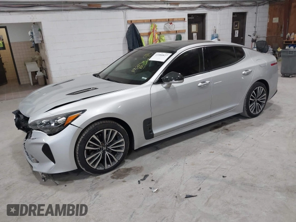 2018 Kia Stinger Premium with VIN KNAE25LA6J6021819, listed as a IAAI auction lot 41880827 with 119,214 mi miles. Bid and sale history available at carsss.com. Image 2.