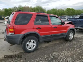 2002 Ford Escape XLT Choice with VIN 1FMCU04132KB16848, listed as a Copart auction lot 55266595 with 205,451 mi miles and Salvage title. Bid and sale history available at DreamBid. Image 3.