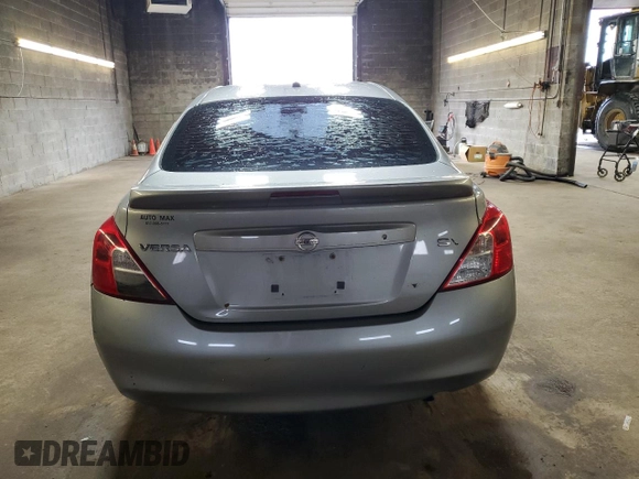 2014 Nissan Versa S Plus with VIN 3N1CN7AP6EL828134, listed as a Copart auction lot 53902045 with 142,825 mi miles and Salvage Title. Bid and sale history available at DreamBid. Image 6.